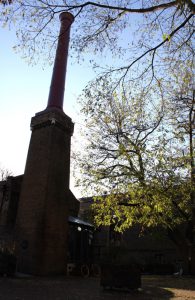 Image of the Brunel Museum north side, with the gallery café next to the chimney